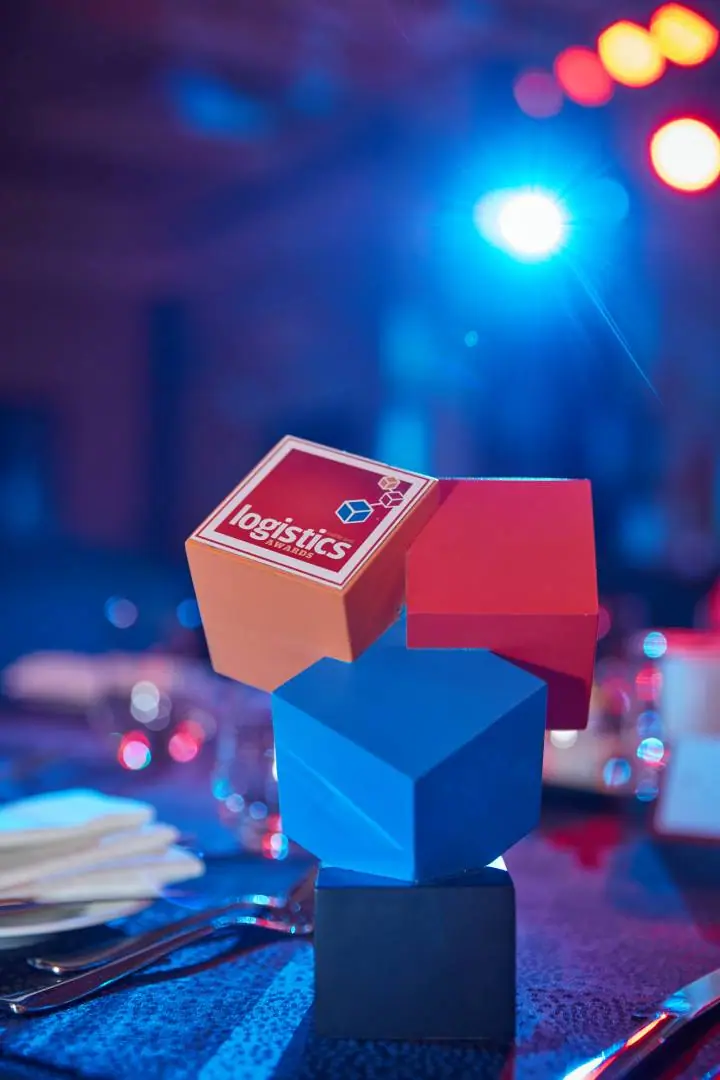Stacked-cube Logistics Middle East Awards trophy on a gala table for the ALS-sponsored 3PL of the Year Award 2022